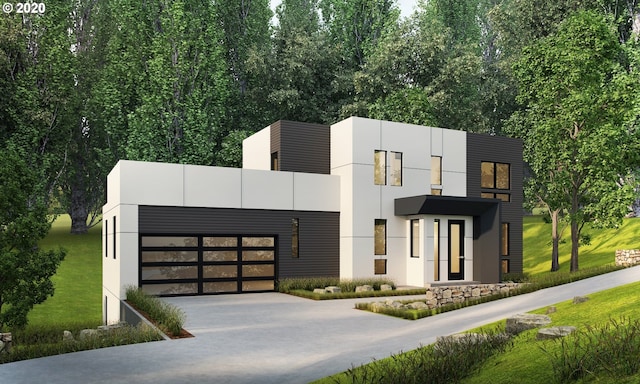 modern home featuring a front lawn and a garage