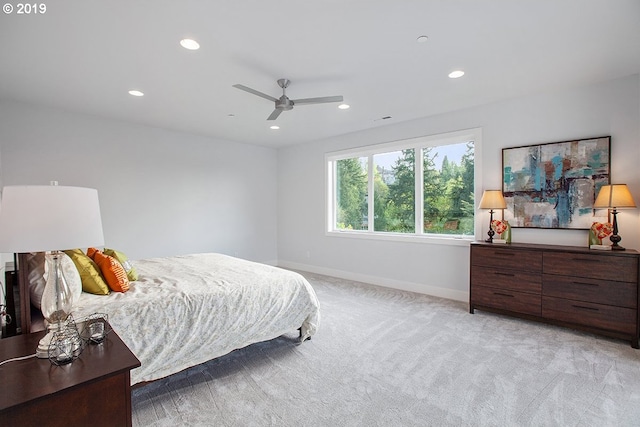 carpeted bedroom with ceiling fan