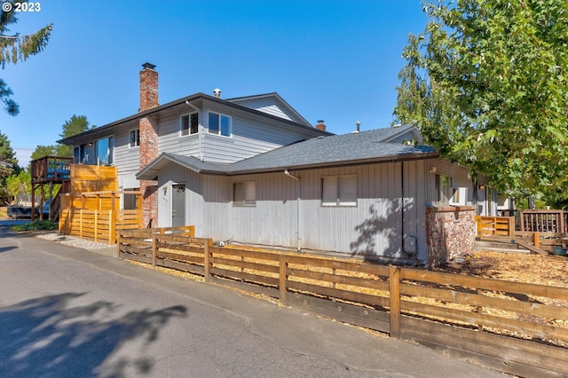 view of front of property with a deck