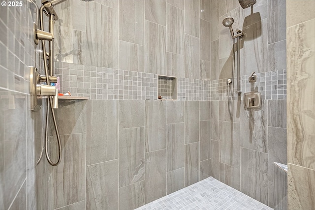 bathroom with tiled shower