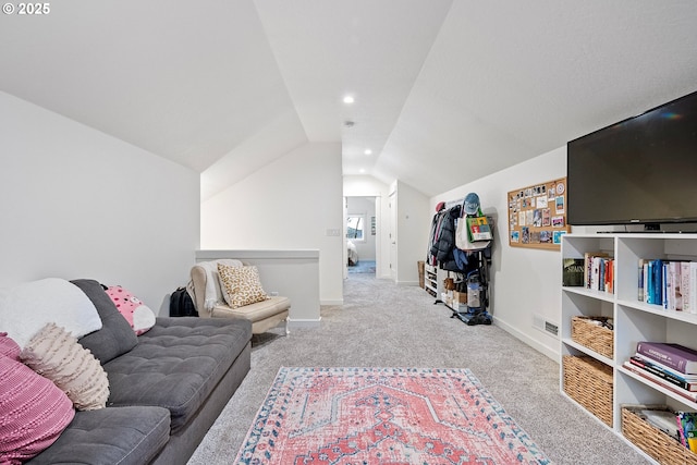 carpeted living area with vaulted ceiling, recessed lighting, and baseboards
