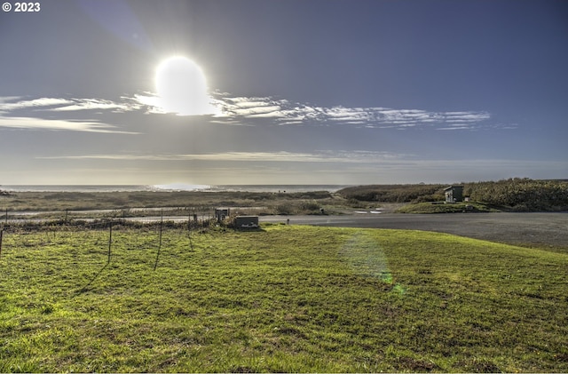 view of yard with a rural view