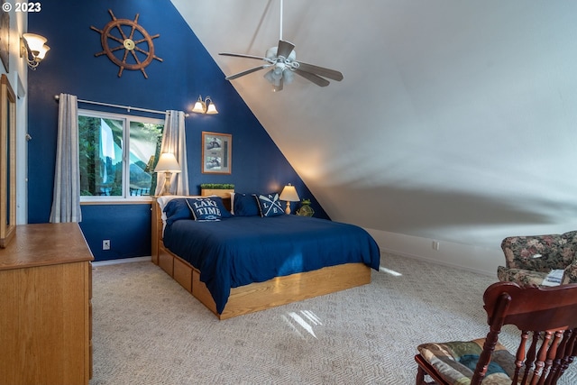 bedroom with high vaulted ceiling, ceiling fan, and light colored carpet