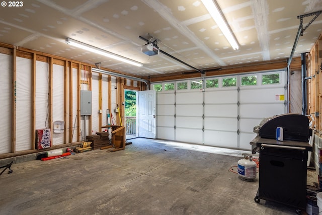 garage featuring a garage door opener