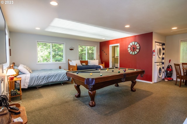 rec room with stacked washer / drying machine, billiards, and carpet flooring