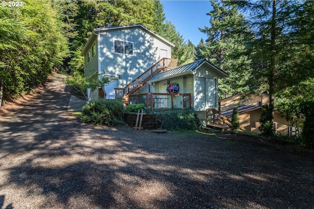 view of front of property with a deck