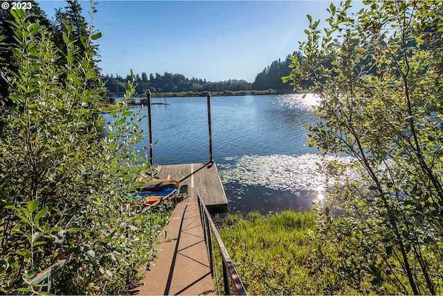 view of dock with a water view