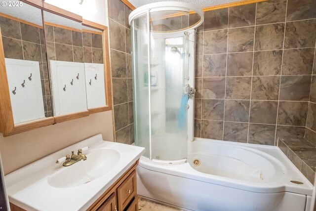 5360 B St, Springfield, OR 97478 - full bath with vanity, a combined bath / shower with jetted tub, and tile walls