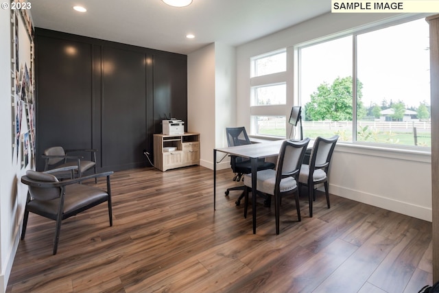 office space with dark hardwood / wood-style floors