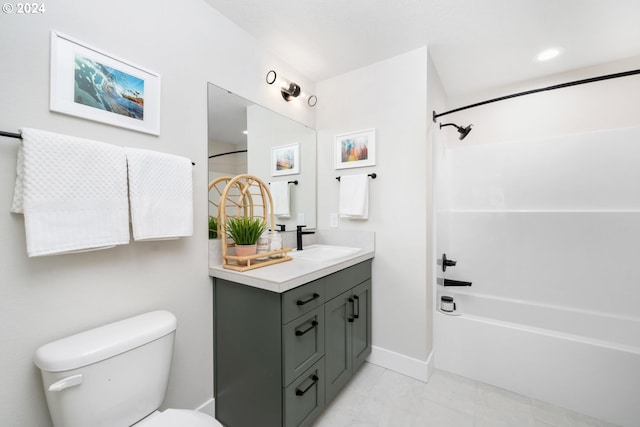 full bathroom featuring toilet, vanity, and shower / bathing tub combination