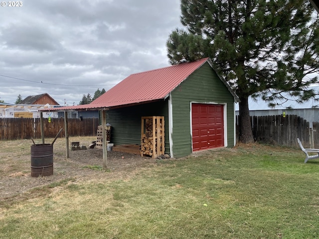 garage with a yard