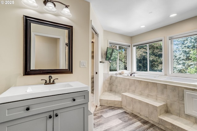 2940 Robinwood Dr, Forest Grove, OR 97116 - full bathroom with a bath, vanity, wood finished floors, and recessed lighting