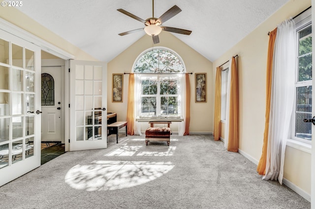 2940 Robinwood Dr, Forest Grove, OR 97116 - living area featuring french doors, carpet flooring, a ceiling fan, vaulted ceiling, and baseboards