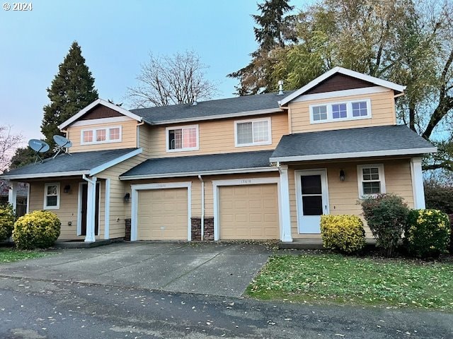 view of front of property with a garage