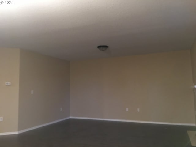 empty room featuring concrete flooring