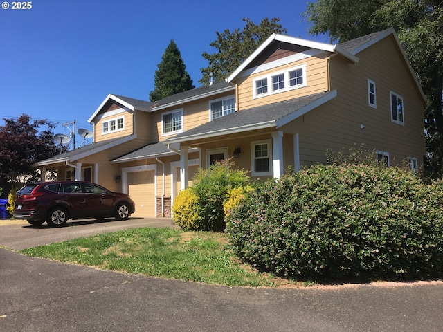 craftsman-style home with a garage