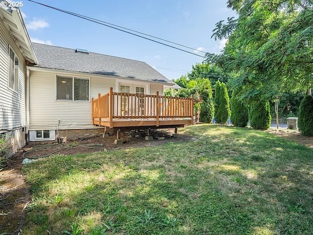 view of yard with a wooden deck