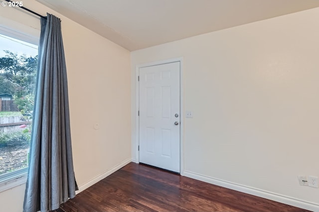 9832 N Clarendon Ave, Portland, OR 97203 - empty room with dark wood-type flooring and baseboards