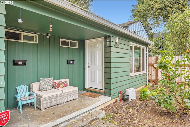 9832 N Clarendon Ave, Portland, OR 97203 - view of exterior entry featuring board and batten siding