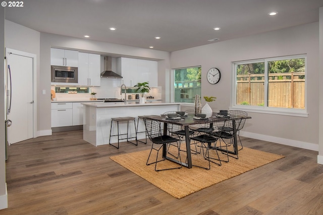 dining area featuring wood-type flooring