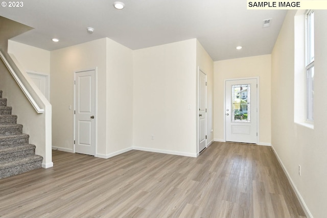 entrance foyer featuring light hardwood / wood-style flooring