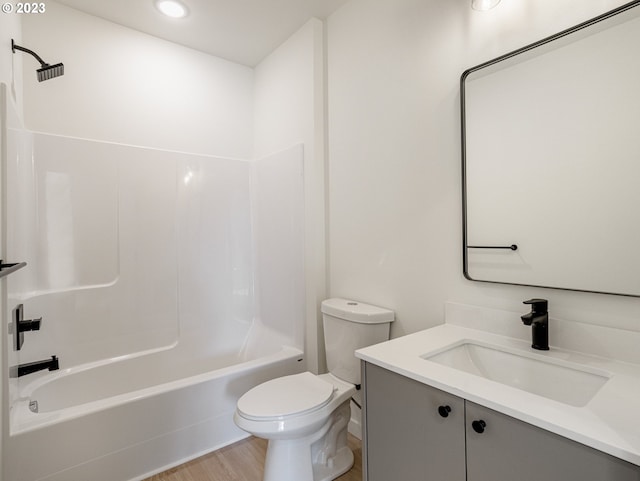 full bathroom featuring shower / tub combination, toilet, vanity, and wood-type flooring