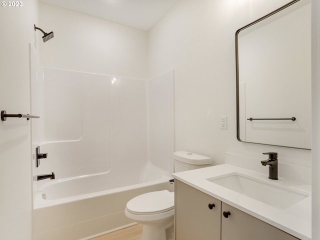 full bathroom with bathing tub / shower combination, toilet, vanity, and wood-type flooring