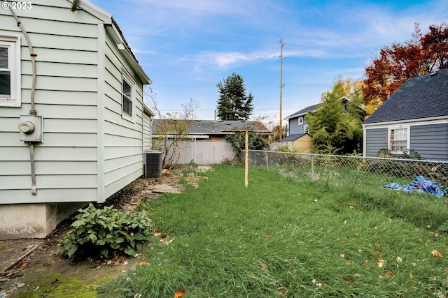 view of yard featuring central AC unit