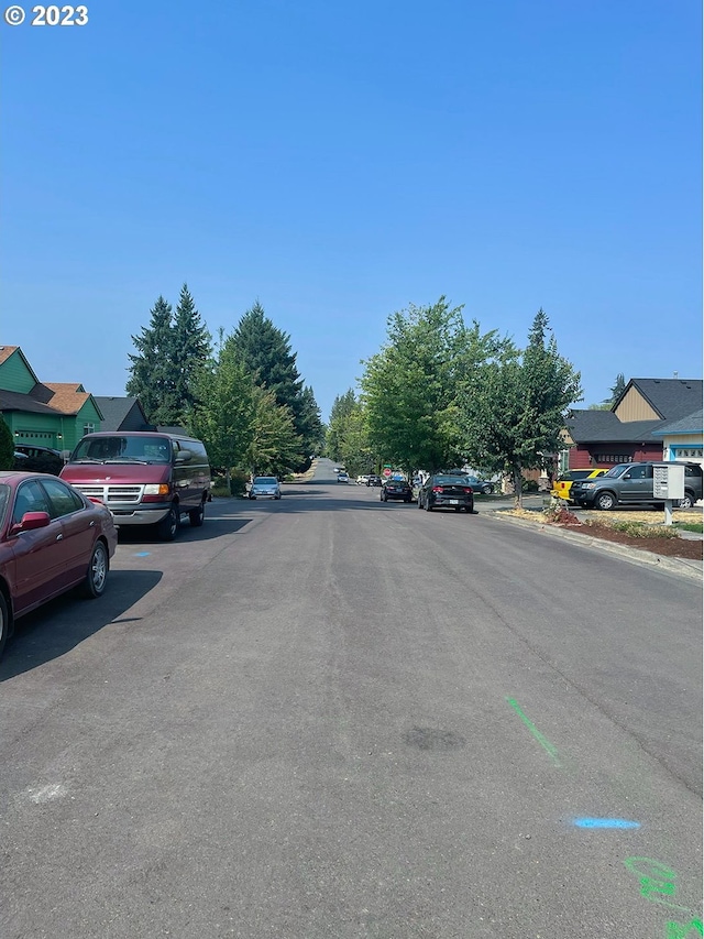 view of road with curbs