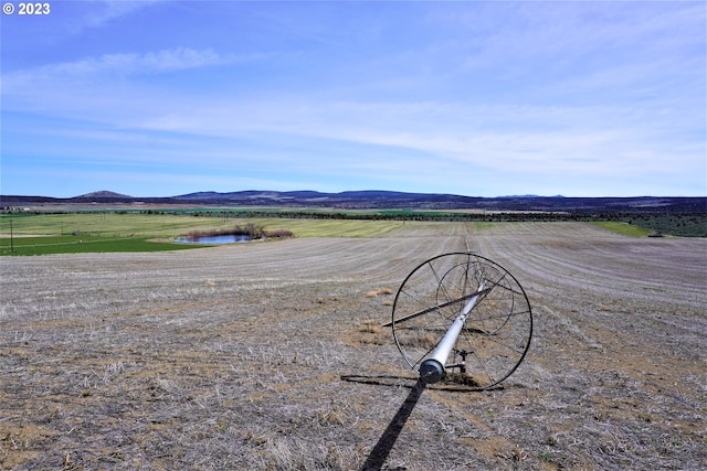 property view of mountains with a rural view