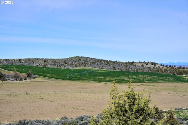 property view of mountains featuring a rural view