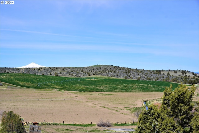 view of mountain feature featuring a rural view