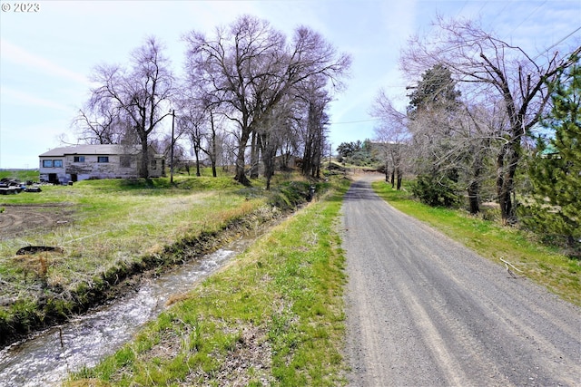 view of road featuring a water view