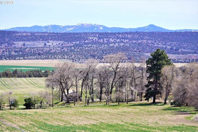 mountain view featuring a rural view