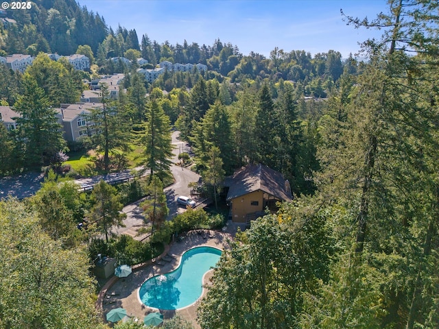 7730 SW Barnes Rd Unit B, Portland, OR 97225 - aerial view of property and surrounding area with a pool and a forest