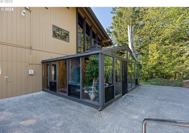 7730 SW Barnes Rd Unit B, Portland, OR 97225 - view of patio with a sunroom