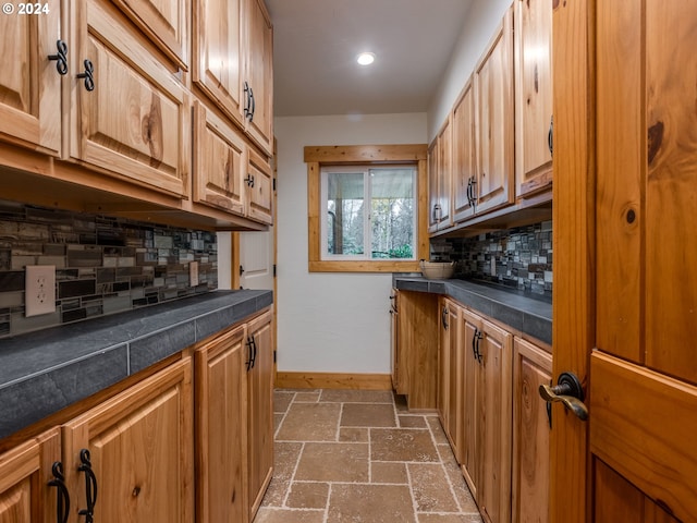 kitchen featuring tasteful backsplash