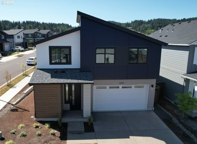 modern home featuring a garage