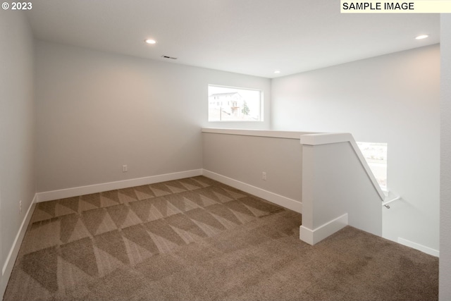 view of carpeted spare room