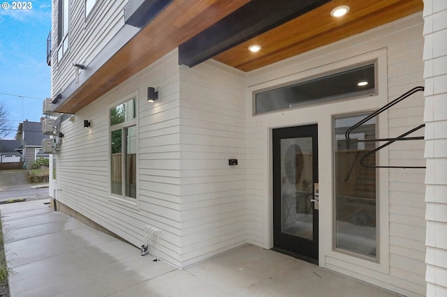 doorway to property featuring a patio area