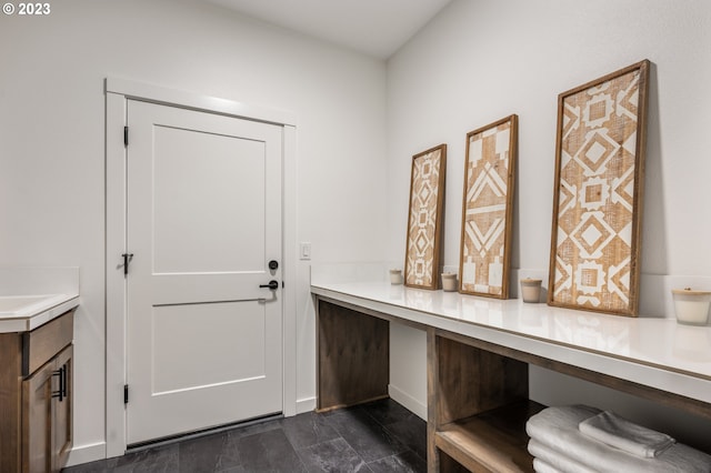 mudroom with built in desk