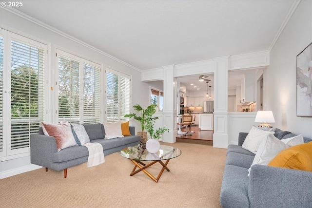 living area featuring light carpet and crown molding