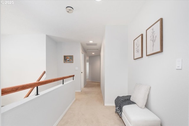 hallway with recessed lighting, an upstairs landing, light colored carpet, and baseboards