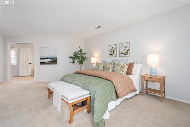bedroom featuring visible vents, baseboards, and light carpet