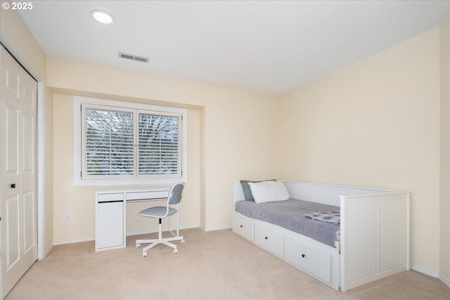 bedroom with visible vents, recessed lighting, and carpet floors