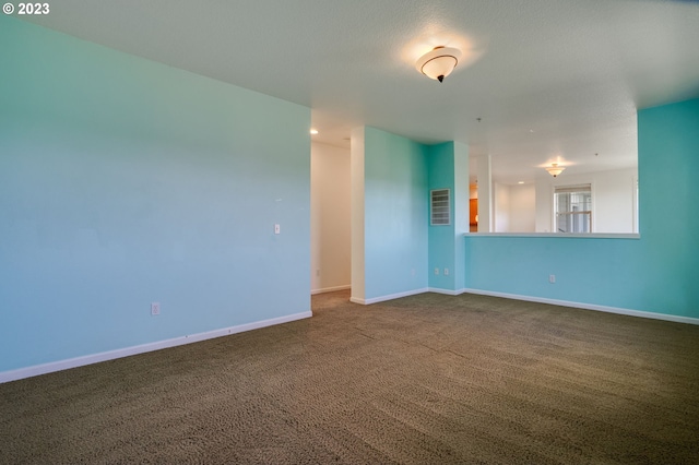 empty room featuring carpet floors