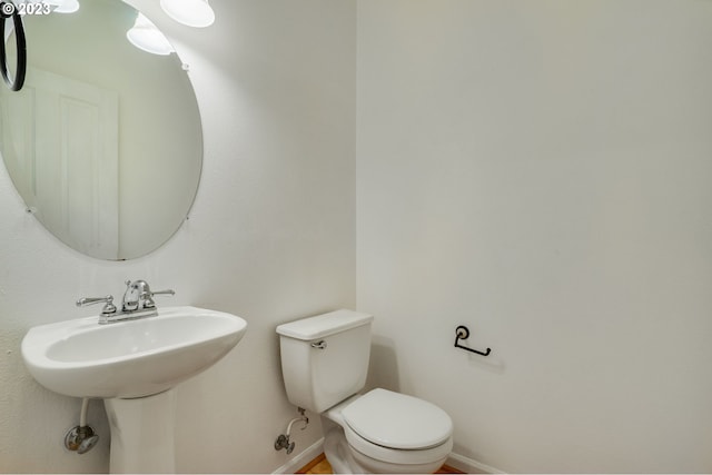 bathroom featuring toilet