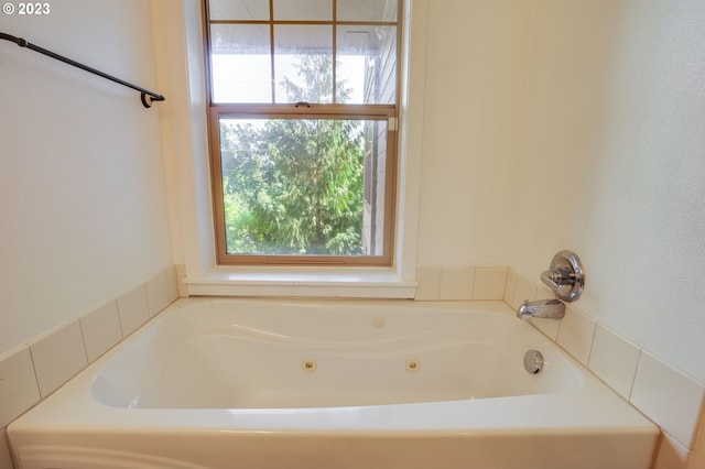 bathroom with a bath to relax in