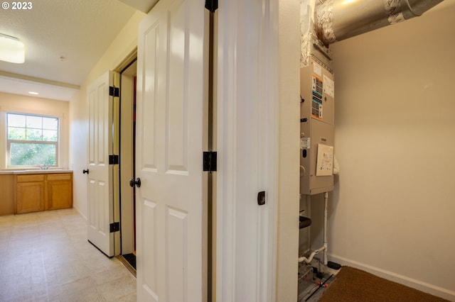 hallway with light tile floors