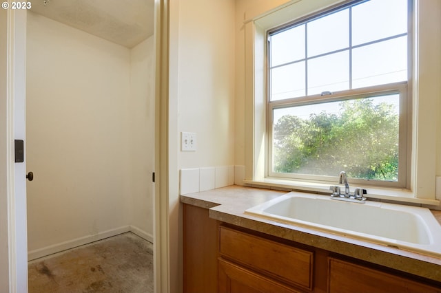 bathroom with a tub and sink